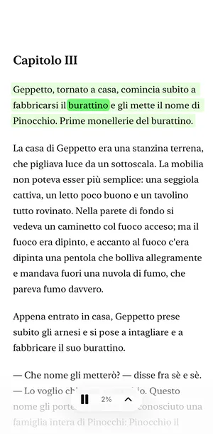 Il lettore di Sandbook su iPhone: Le avventure di Pinocchio con il paragrafo in lettura colorato di verde e, al suo interno, evidenziata la parola pronunciata, «burattino»
